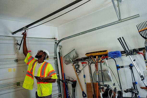 Professional Garage Door Panel Replacement technician working in De Motte, IN